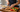 Overhead flat lay of weekly meal prep containers with high-protein foods. 